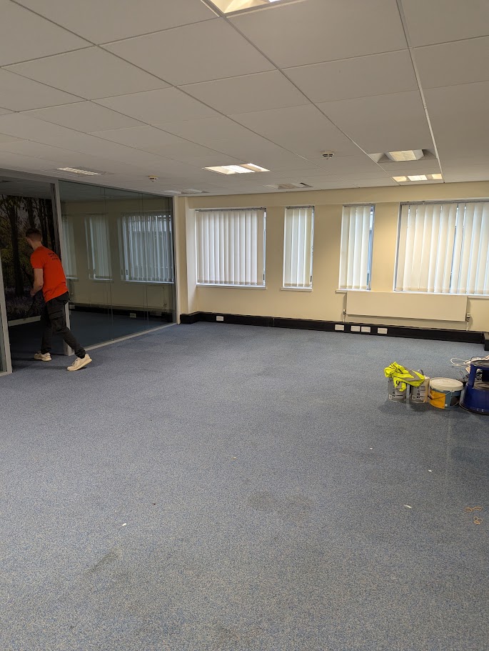 Decorating maintenance being carried out in an office environment