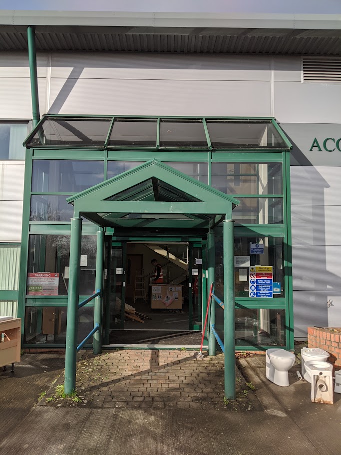 Commercial glass replacement work being carried out safely