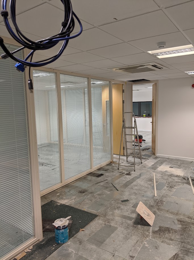 New partition walls being installed during a commercial office refurbishment project