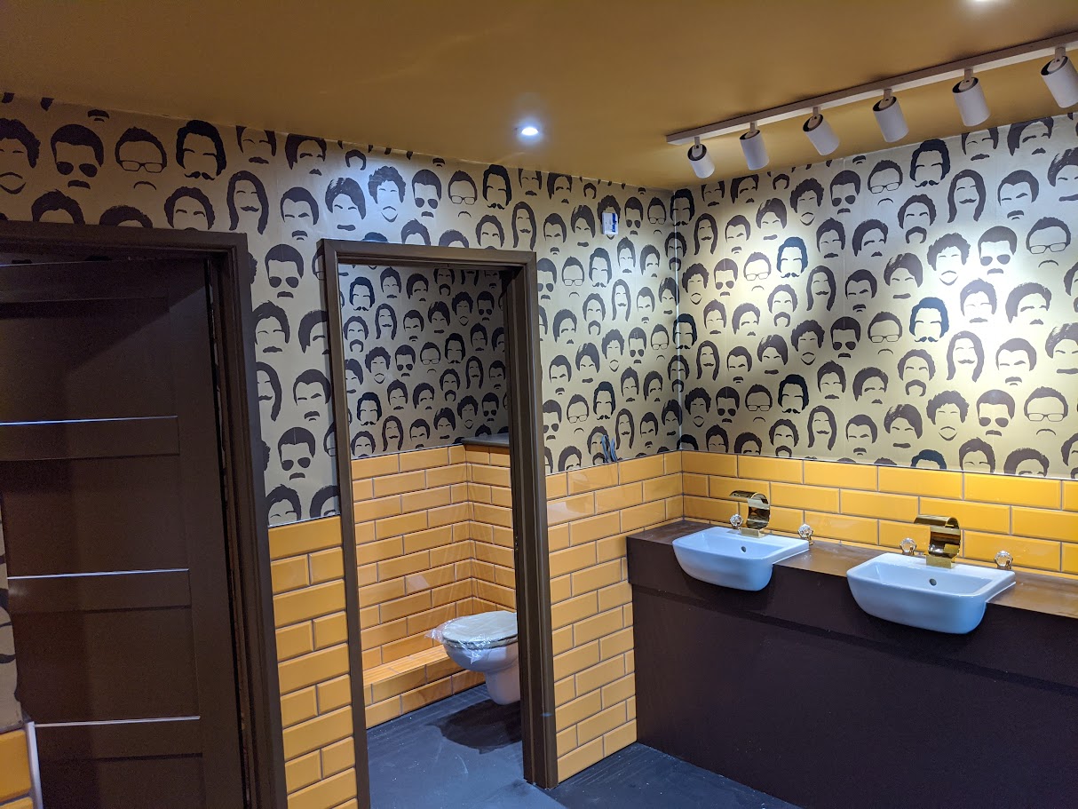 Finished commercial wallcovering installation with clean edges and aligned seams