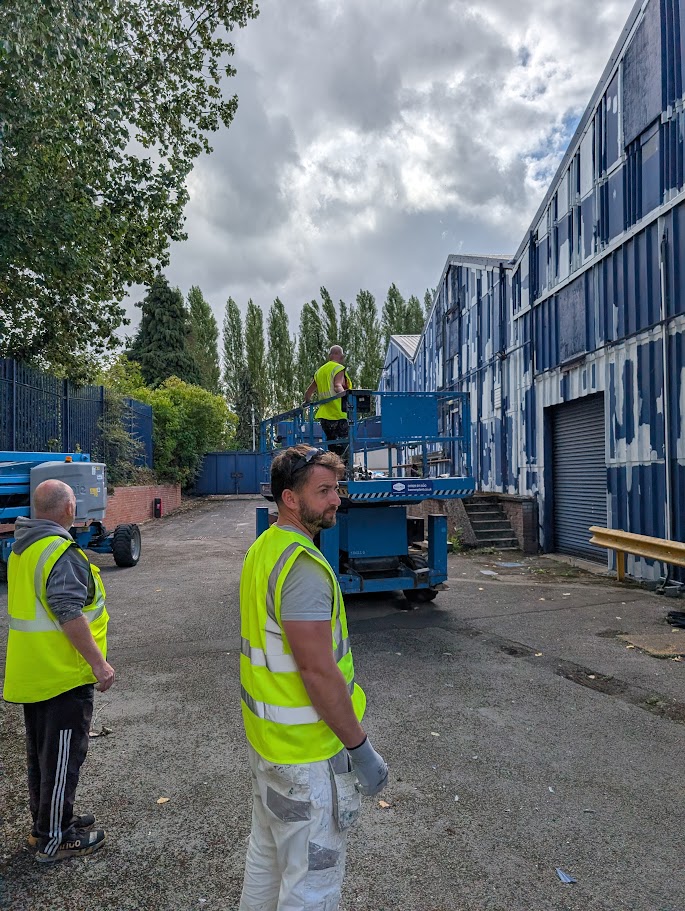 Contractors on Commercial Spray Painting Project