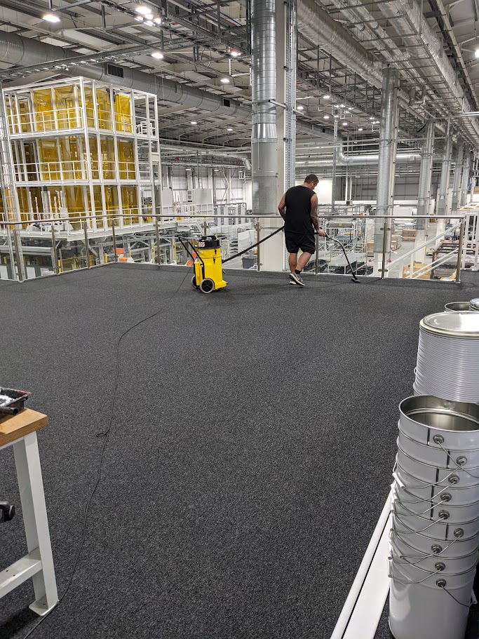 Heavy-duty carpet tiles installed in a high-traffic commercial area