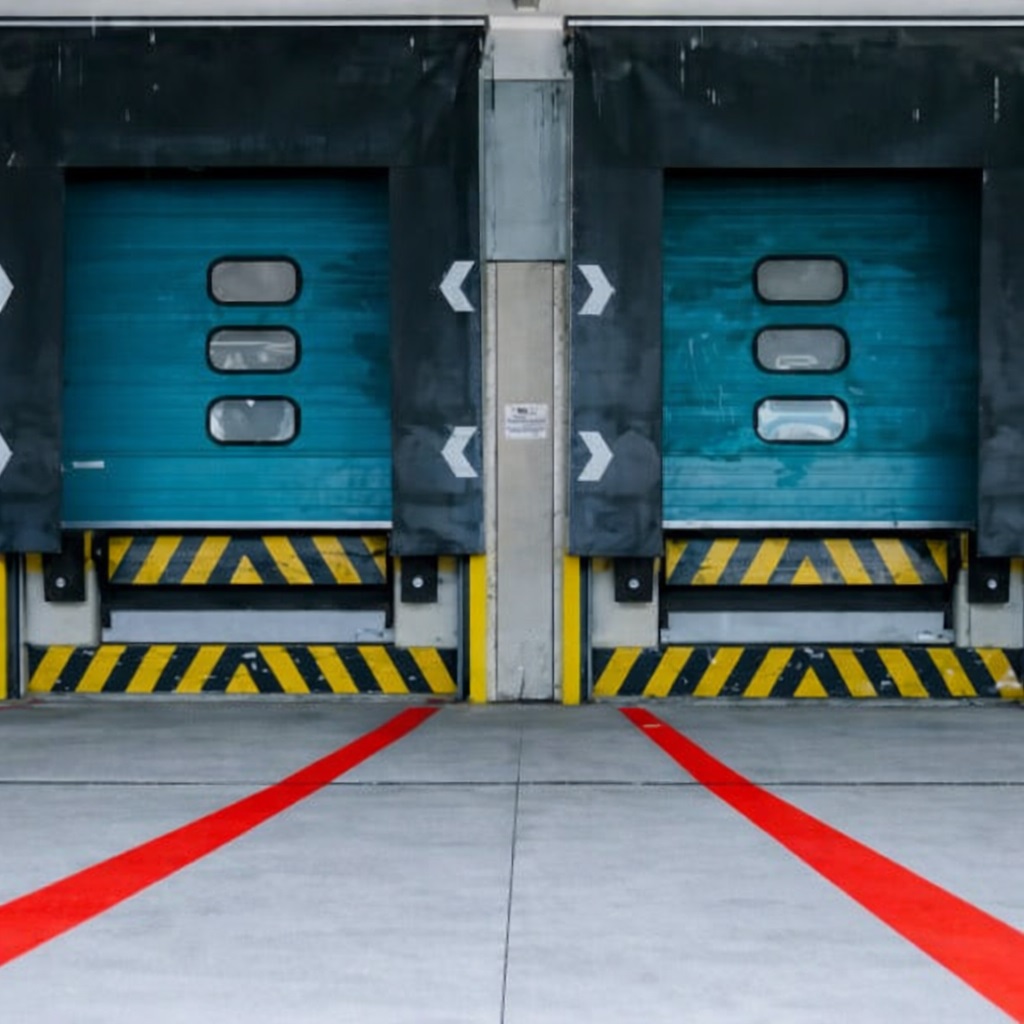 Loading bay line marking and bay numbering in a commercial warehouse