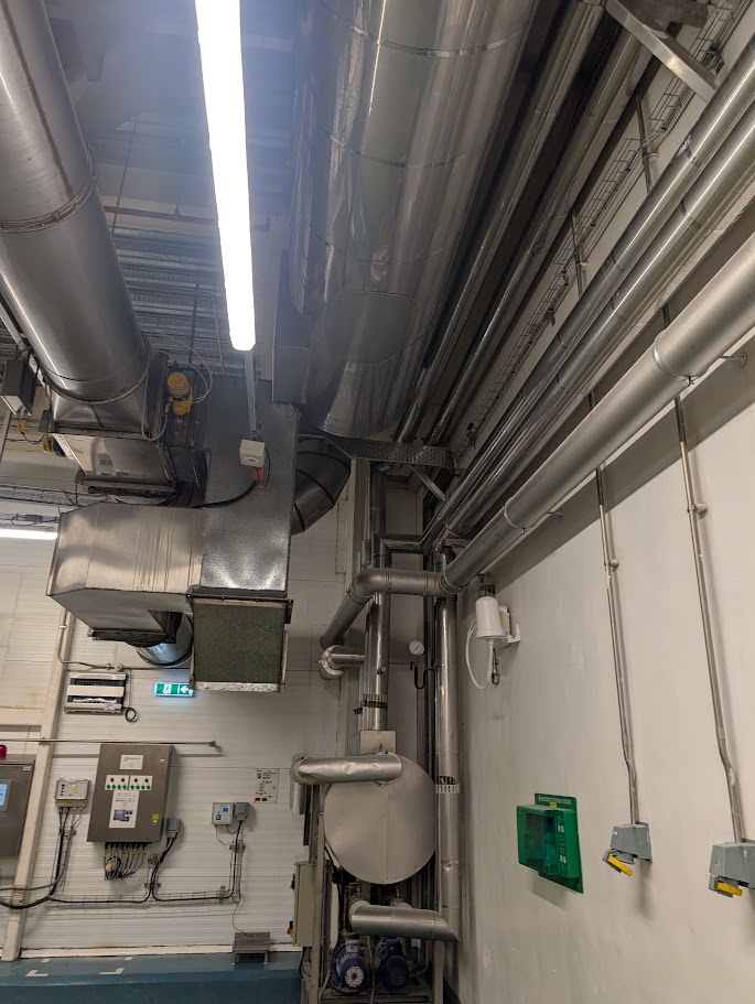 Painting and coating services in a plant room to protect surfaces