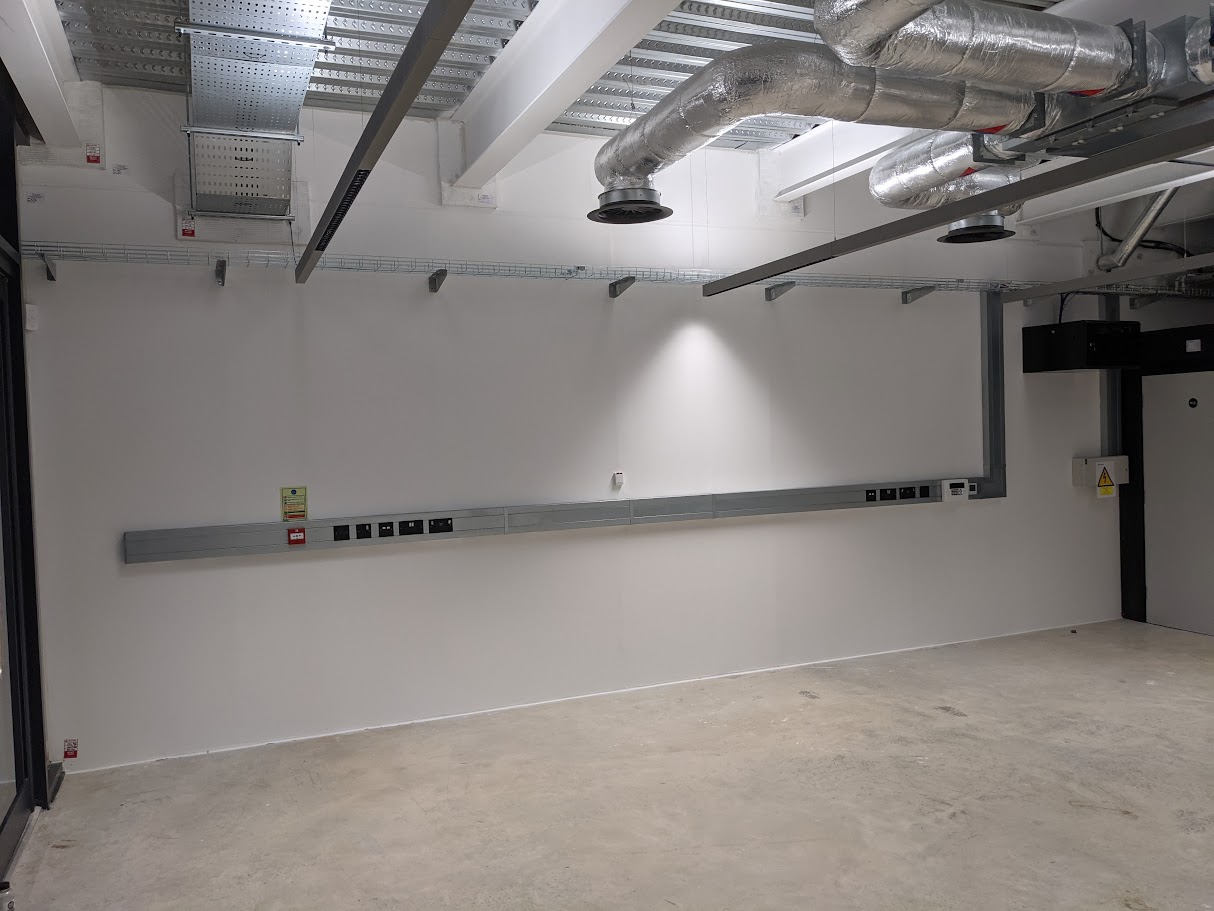 Installing power sockets and trunking in a commercial space