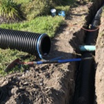 Commercial groundworks contractor installing drainage and concrete