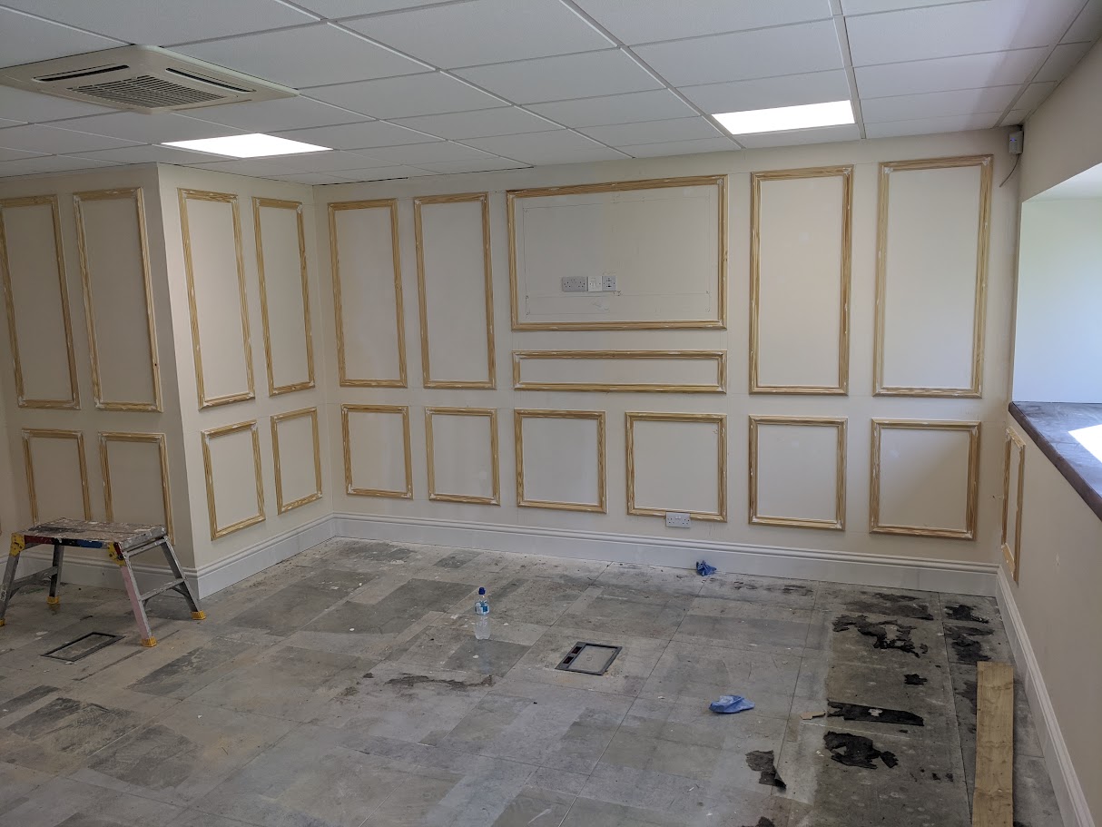 Preparing a subfloor before fitting carpet tiles in a commercial space