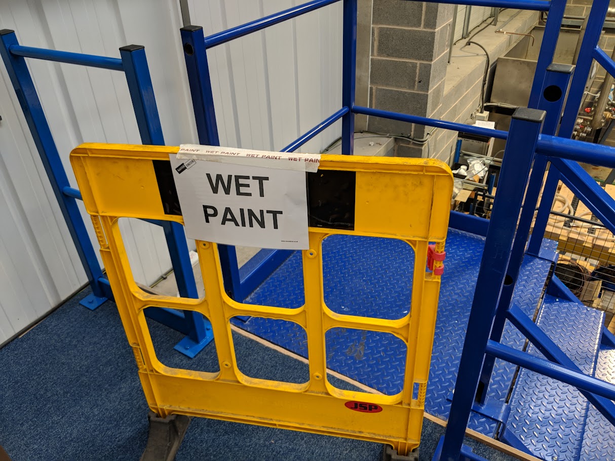 Wet sign on barrier